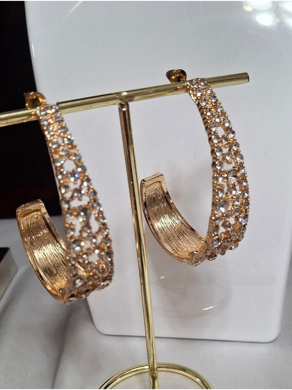 Oversized J-hook earrings with Rhinestones pierced